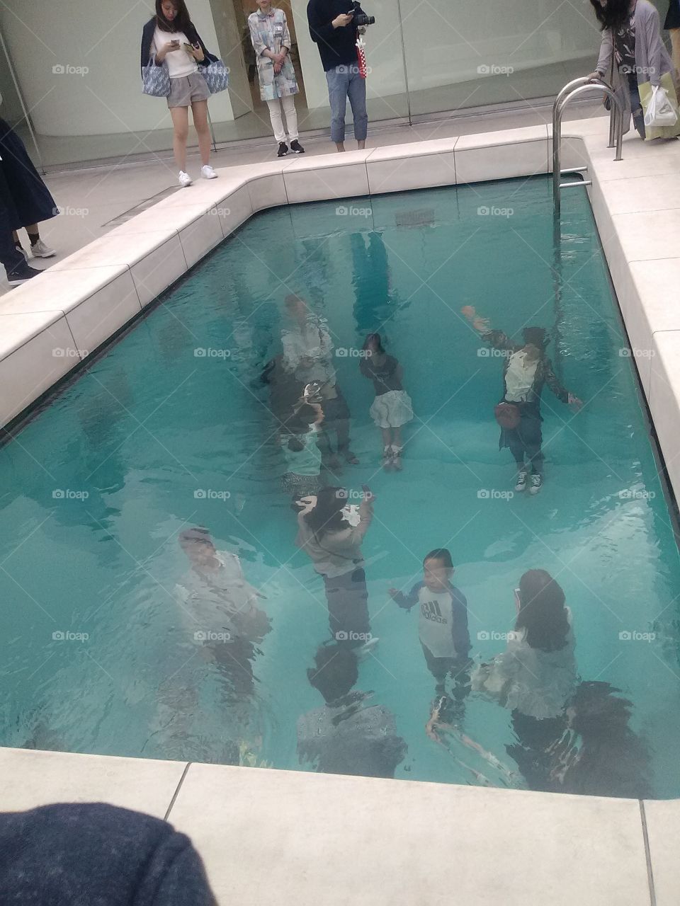 Illusion of being in a swimming pool at the Kanazawa Contemporary Art Museum - Kanazawa, Japan