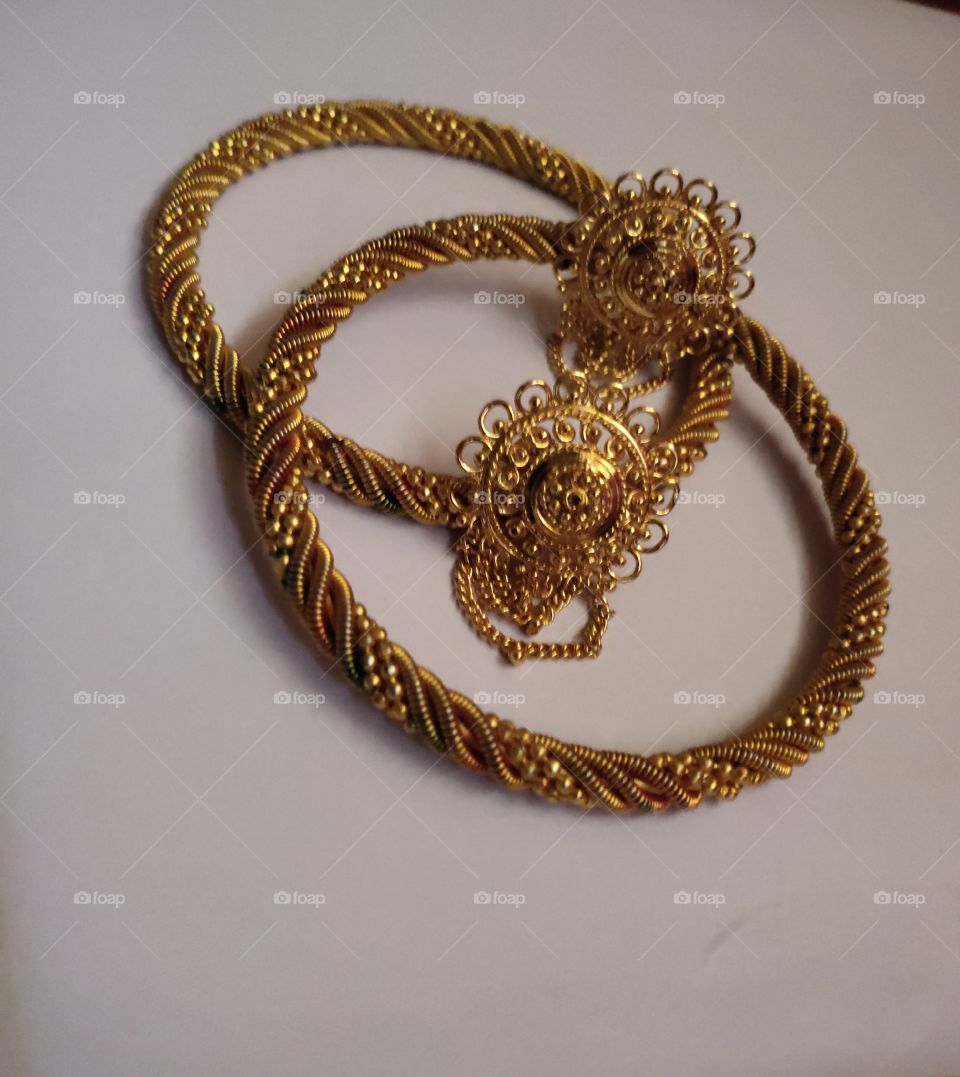 Golden Bangles are loved by all females to wear, which enhances the beauty