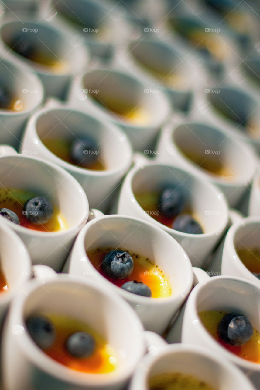 Multiple individual creme brûlée desserts