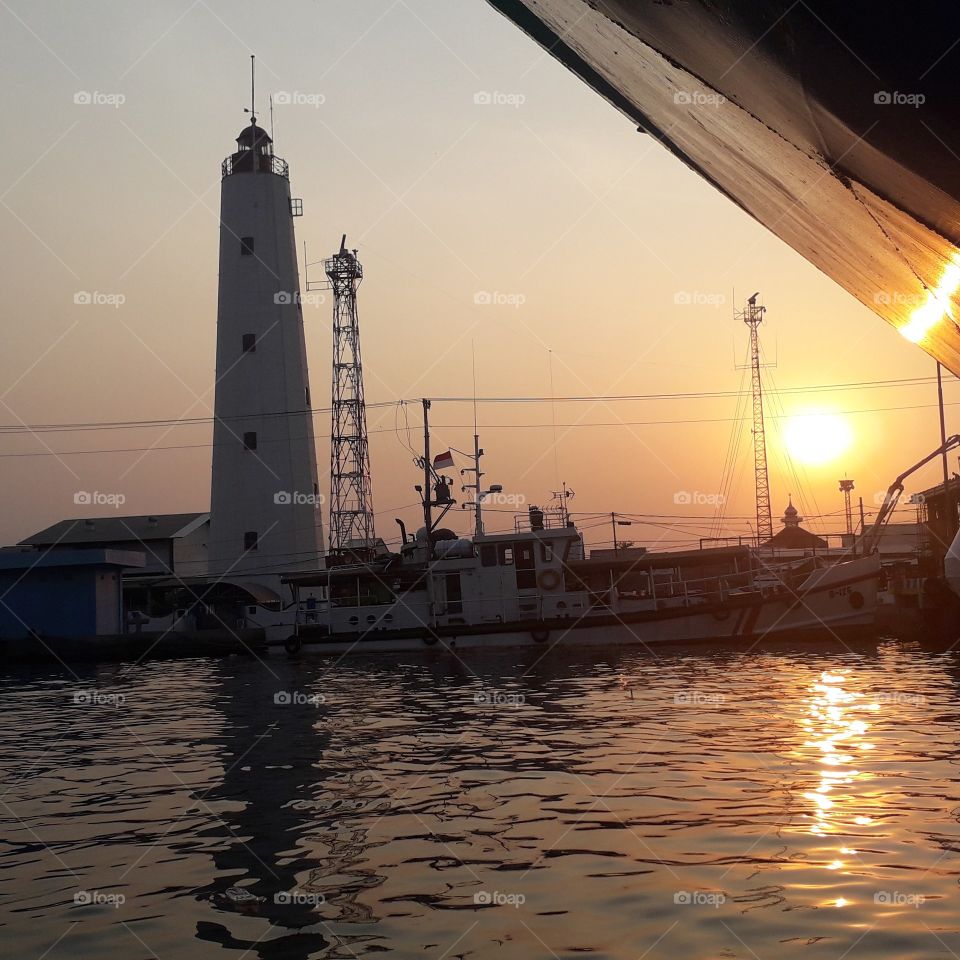 Sunset moments at the port of Tanjung Mas Semarang, Indonesia.
Photo taken on October 22, 2019.