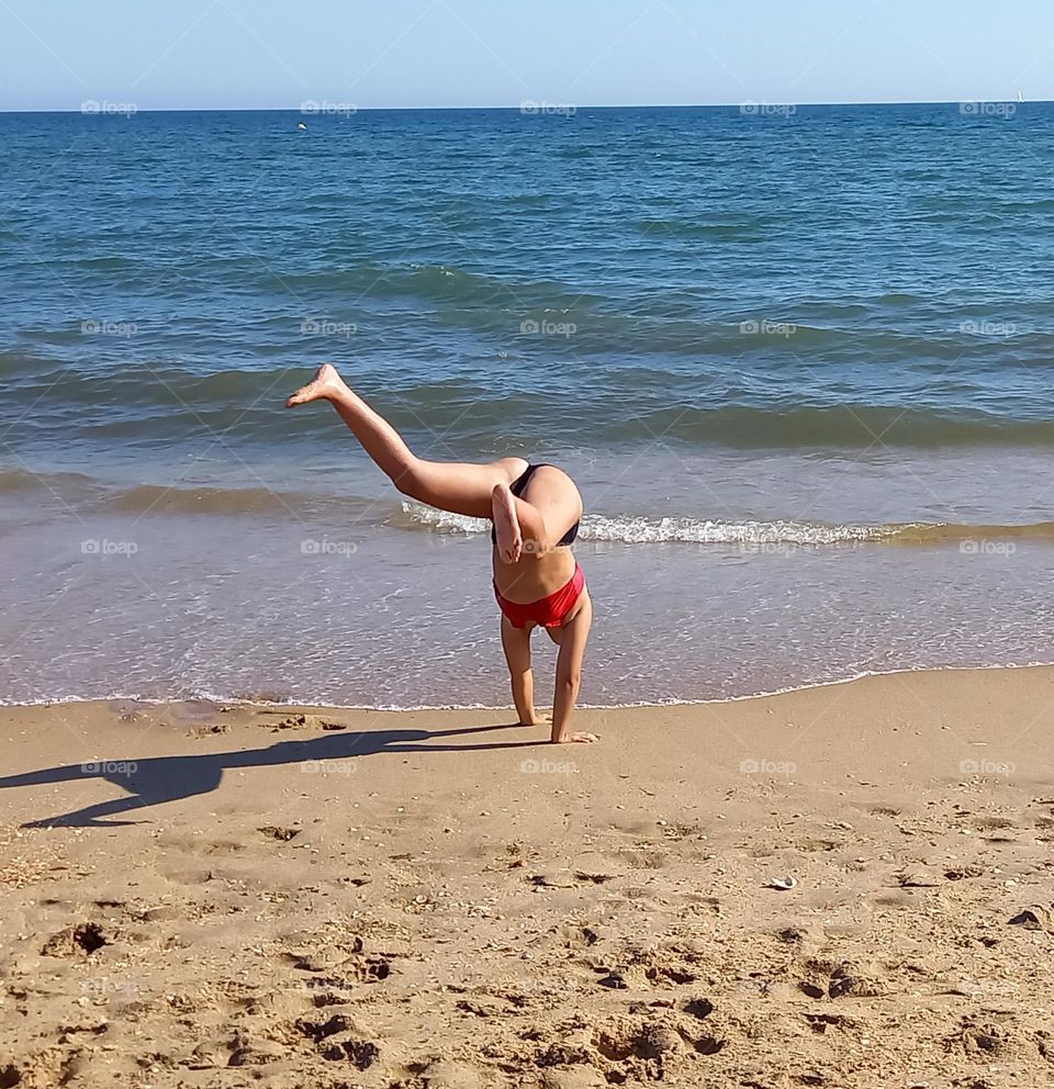 Acrobacias en la playa