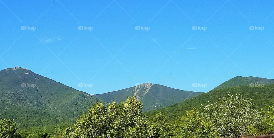 3 mountain peaks
