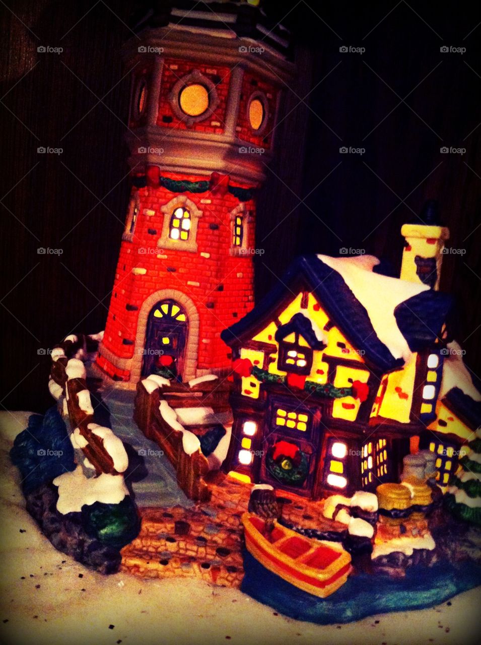 Light House . Taken very close to our small ceramic Christmas village.