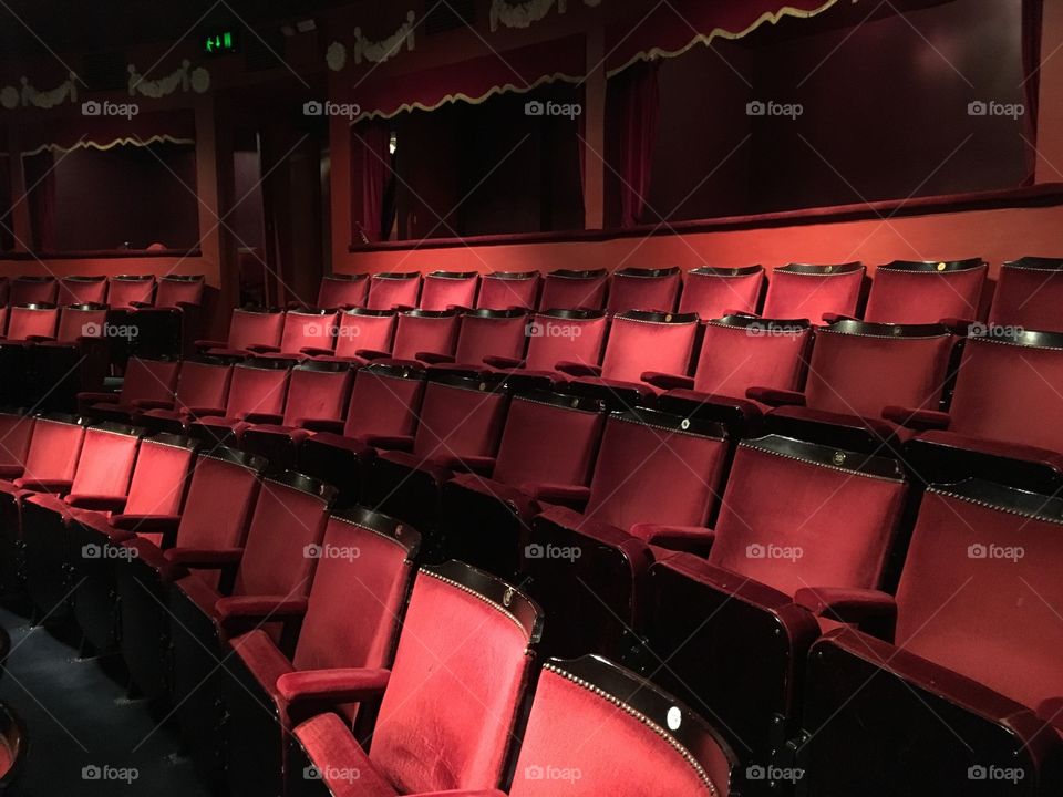 Curve of red seats in the theater