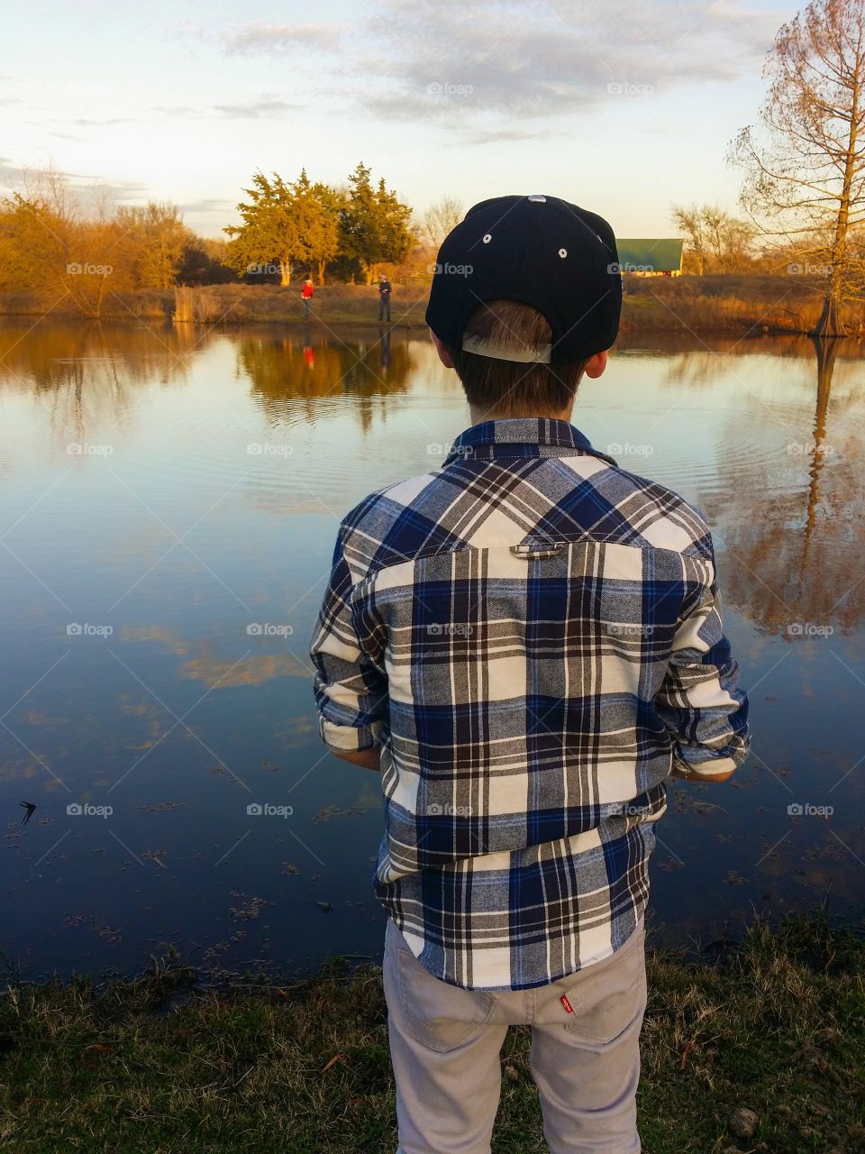 Boy Fishing in a Rural Setting