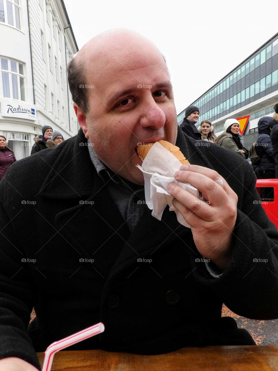 Man eating a hotdog