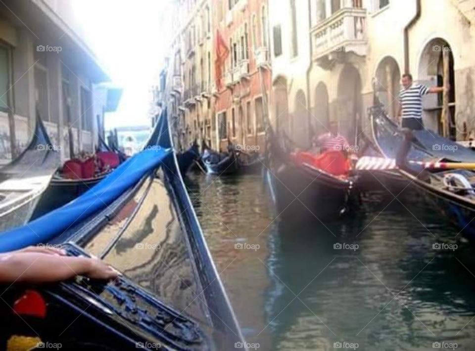 gondolas passing @ Venice