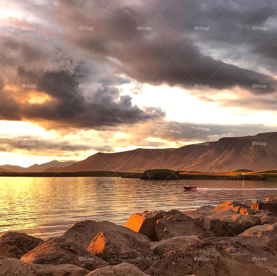 Beautiful time of day down by the docks.  One of my favorite spots to catch a sunset.  Someone was having an even better time riding the waves into that sunset 🌅