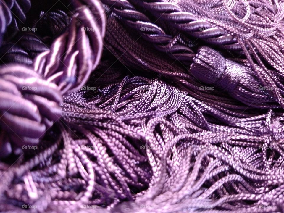 Extreme close up of purple tassel