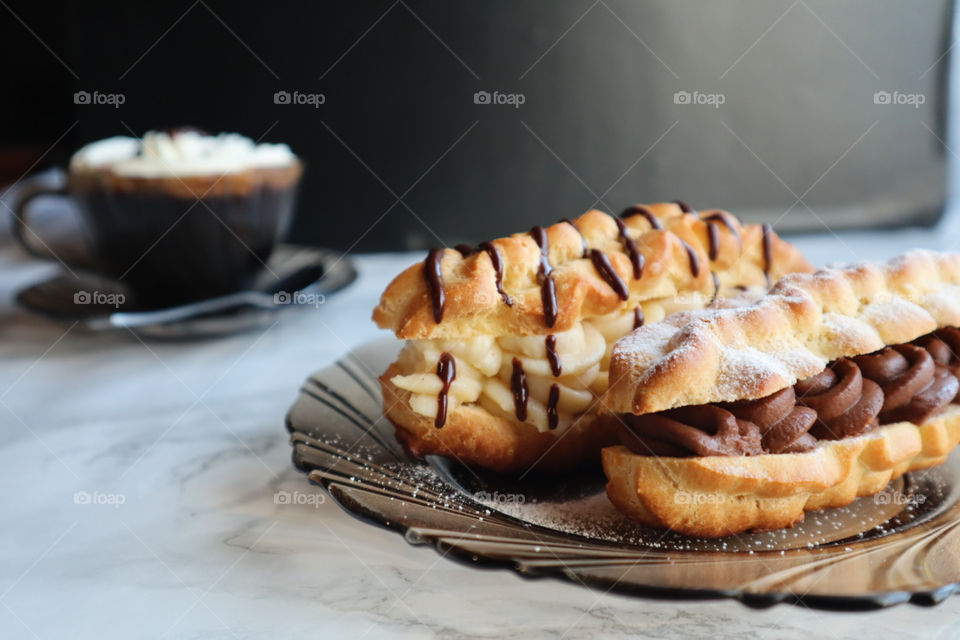 Good morning with coffee and eclairs