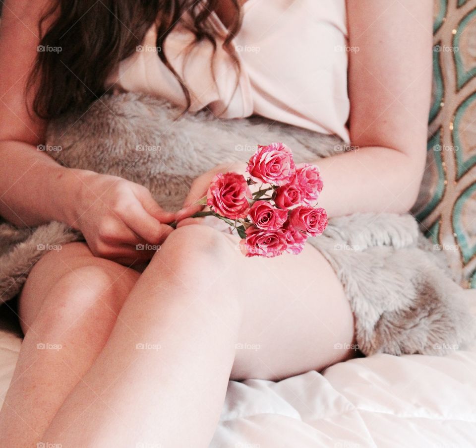 Girl with pink roses