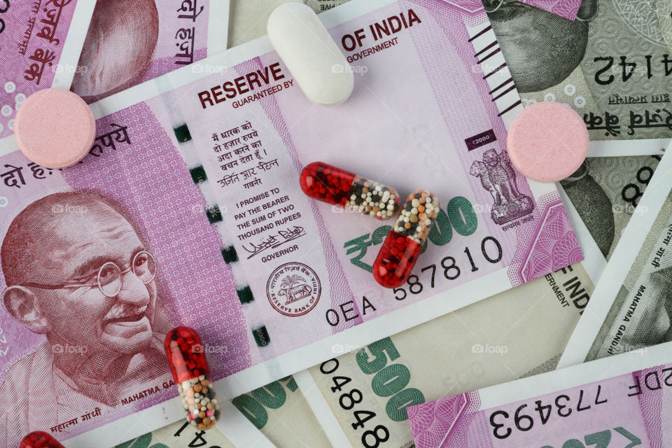 Medicine Capsules on Indian currency rupees