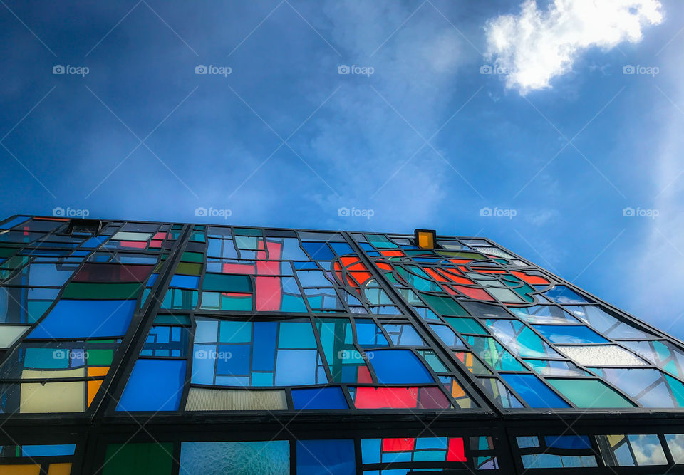 Stained glass art against sky