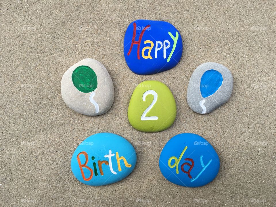 Happy 2 Birthday on colored stones