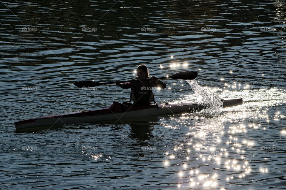 Canoeing at sunset