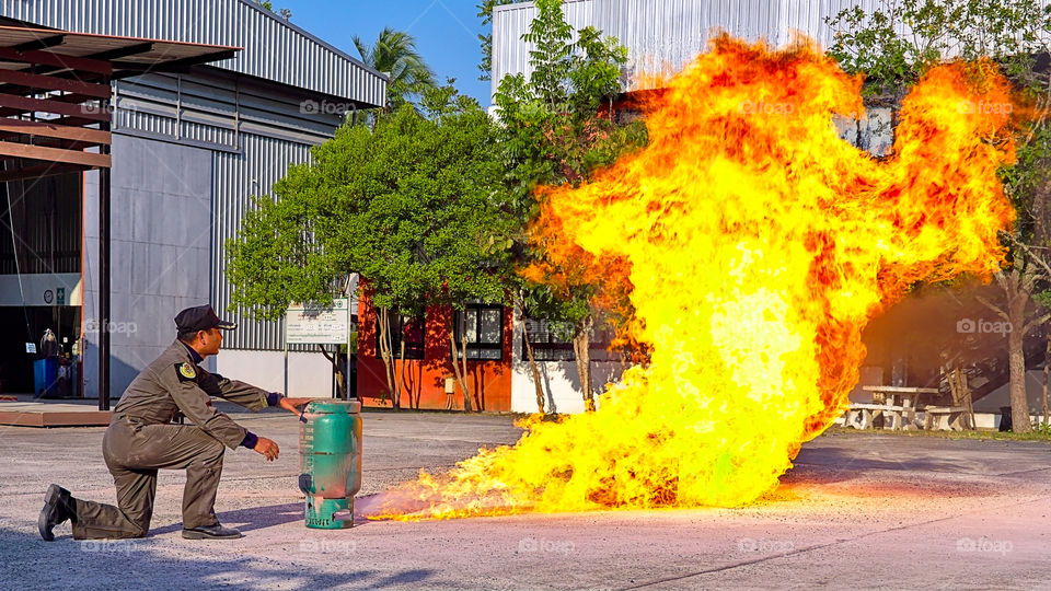 Fire suppression drill using gas tank on fire