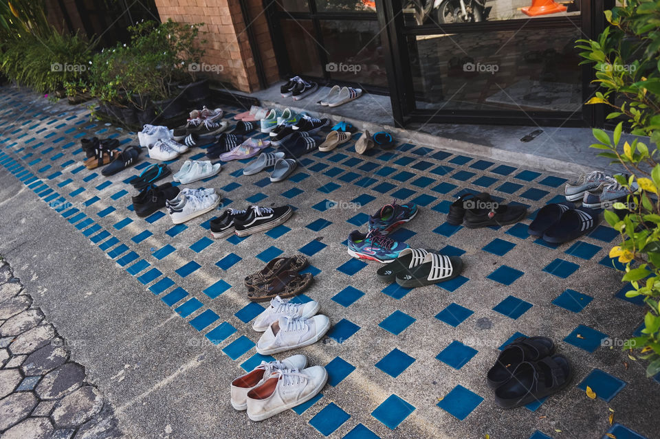 Shoes outside of a school in Chiang Mai, Thailand 