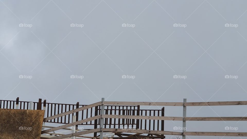 fence in foggy weather