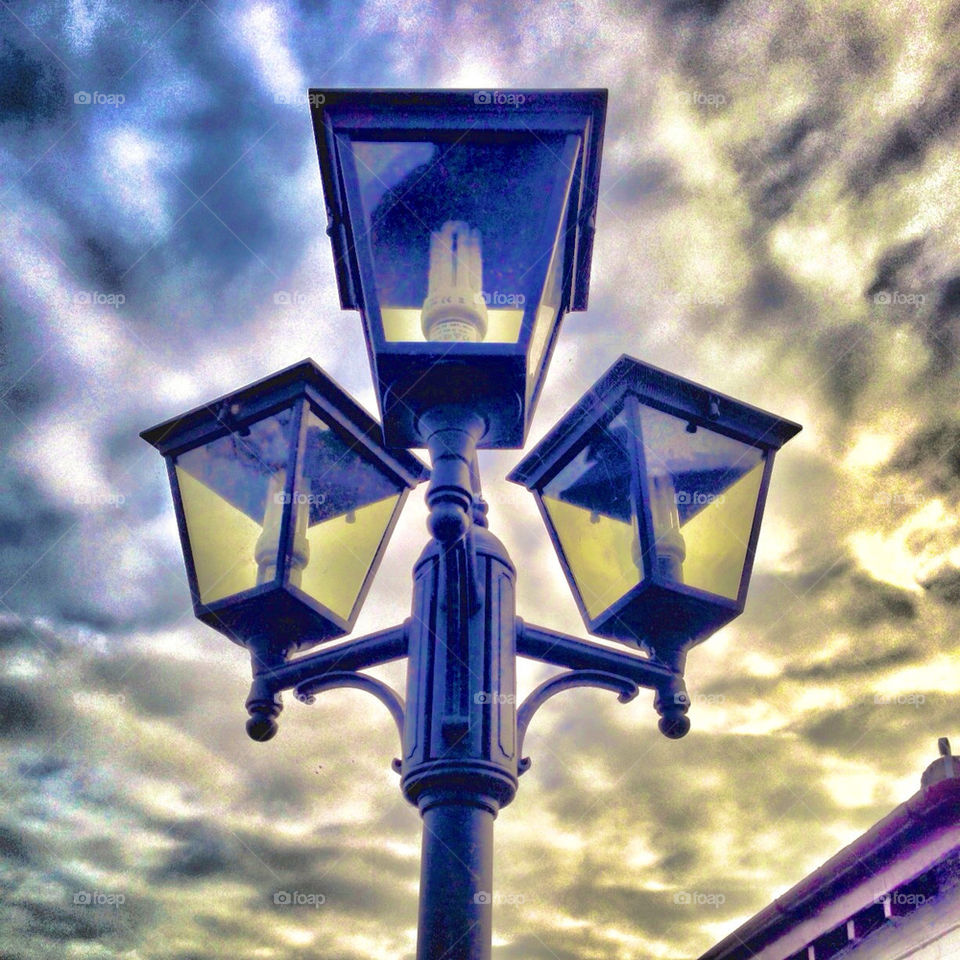 Lights in the sky. Streetlights with s dramatic sky
