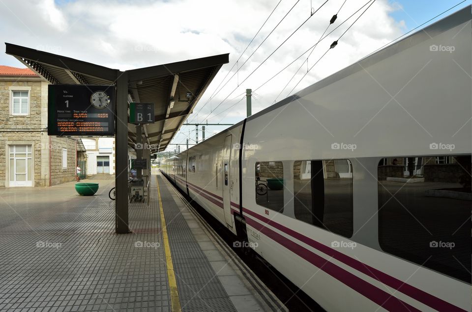 Waiting to get on the train at Santiago railway station.