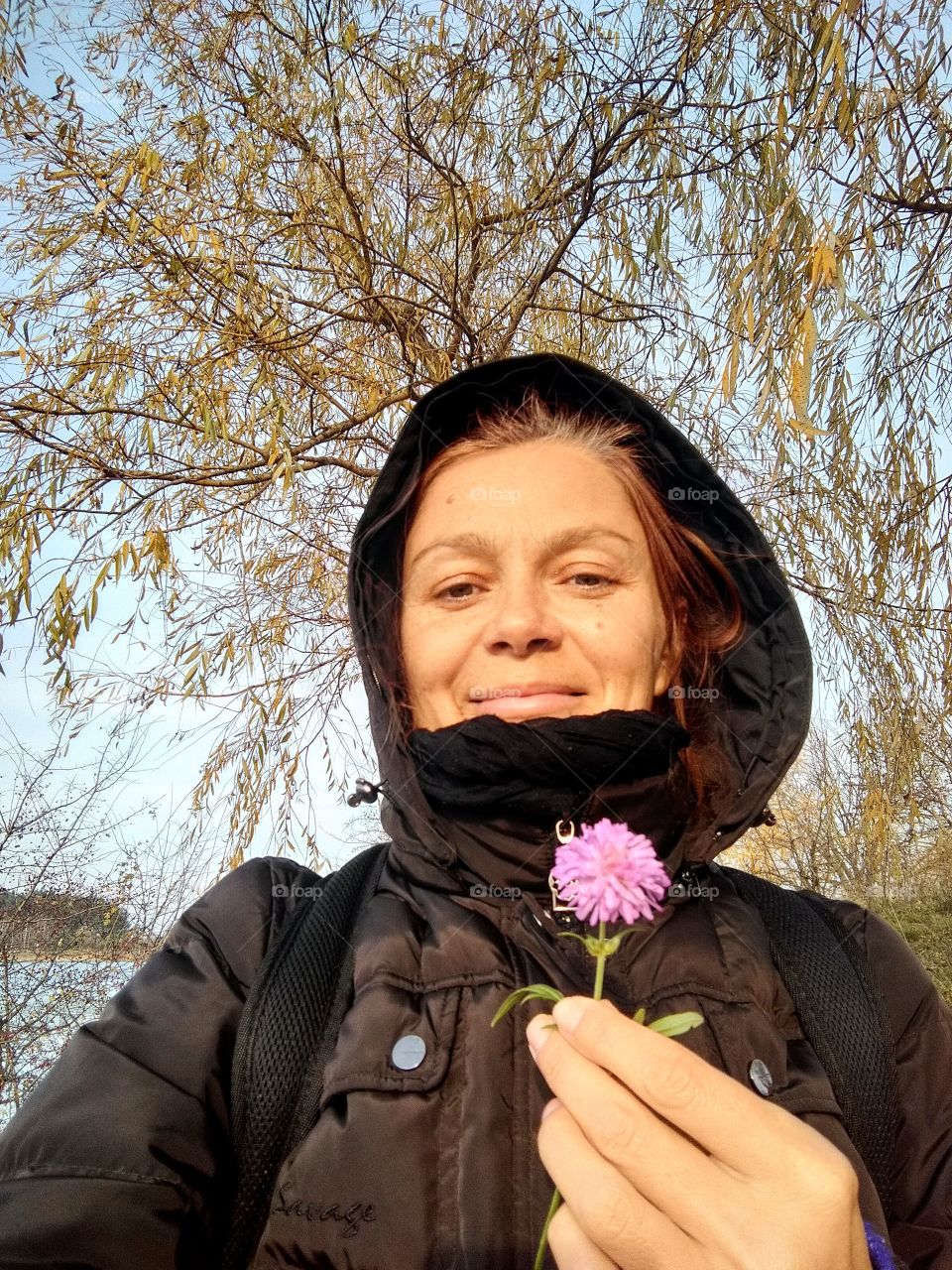 selfie girl on the nature with flower autumn time