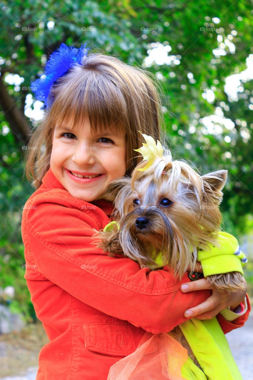 Little girl with her little pet