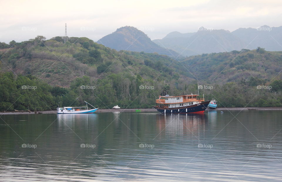 Corner side of harbour for calling bay . A harmony life of salt to the lined of mangrove beside of. Lovely site of salt to park for the watercraft , boot of tourism , and than function of fisheries .