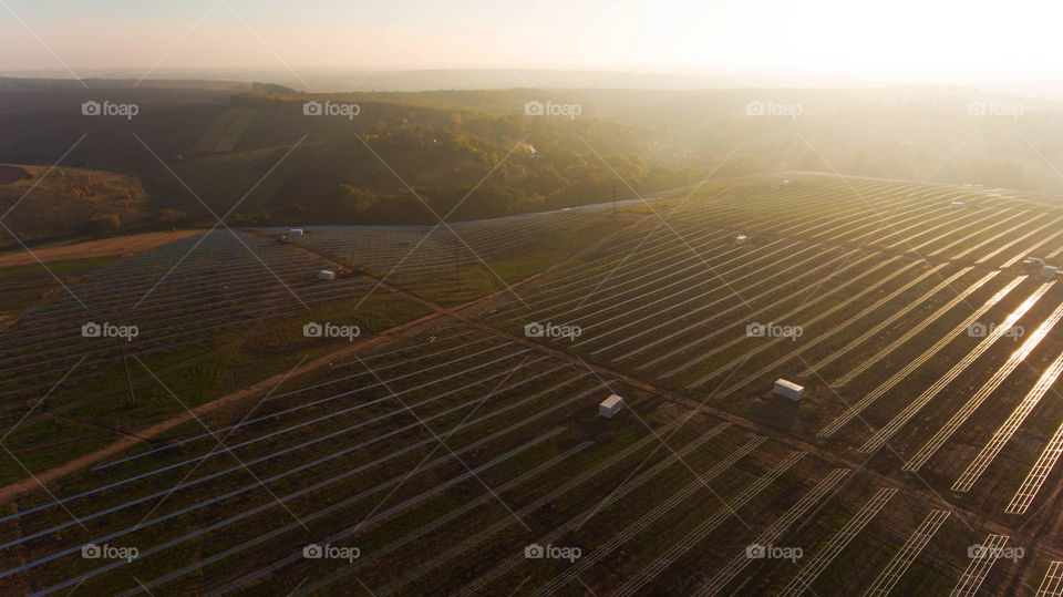 Solar power station from above. Sunset