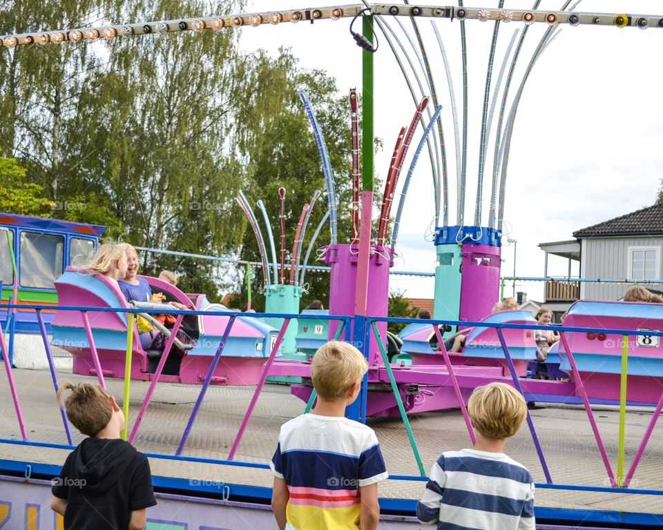 Children having fun at the amusement park