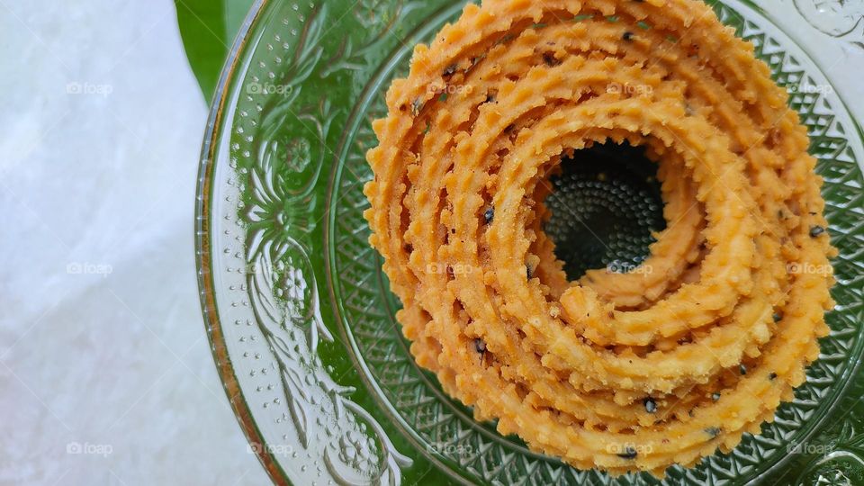 The Circle of Snacks, murukku, a snack usually made of rice or urad dal flour, formed into a twisty shape, Indian snacks