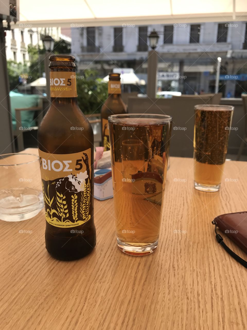 Taking a break in Athens and drinking some beer.