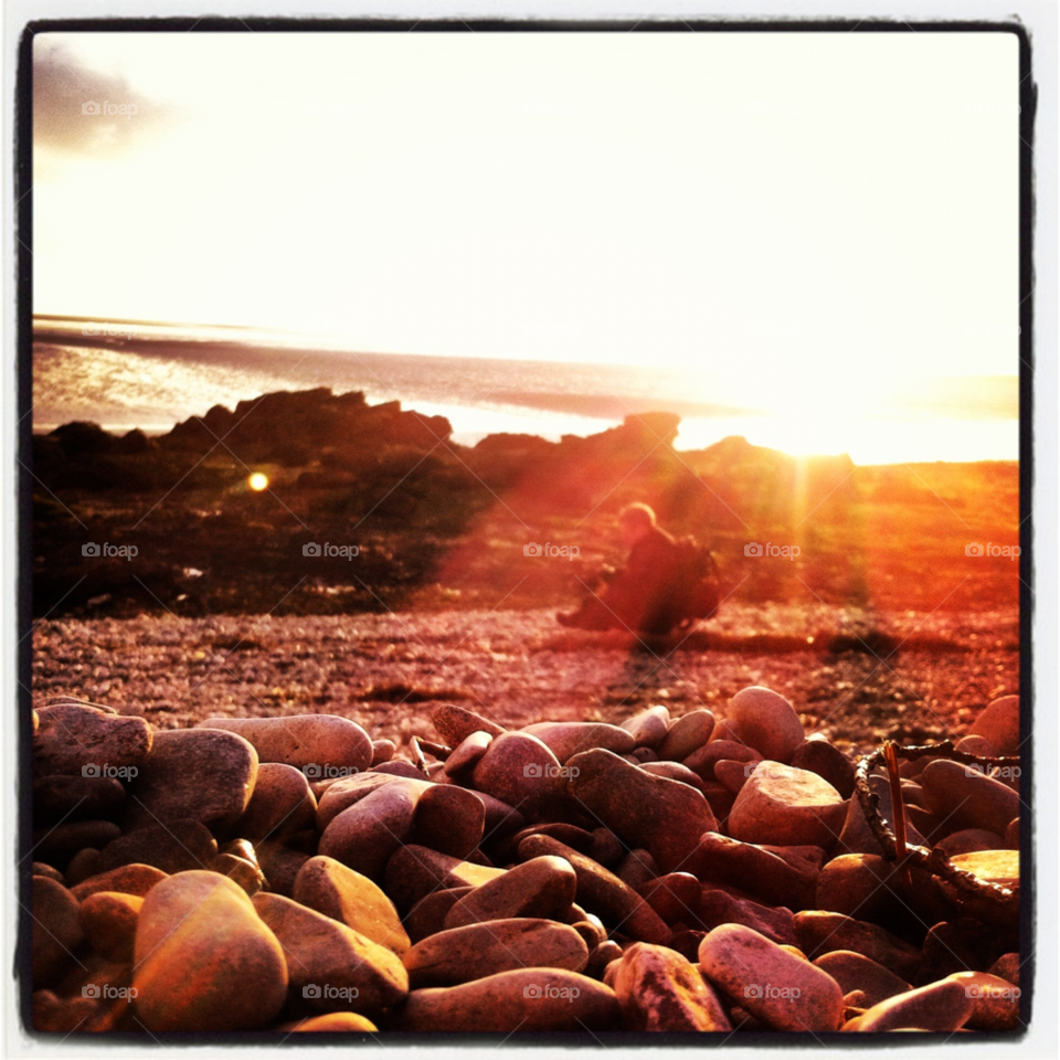 beach sunset pebbles silverdale by emmawhewell