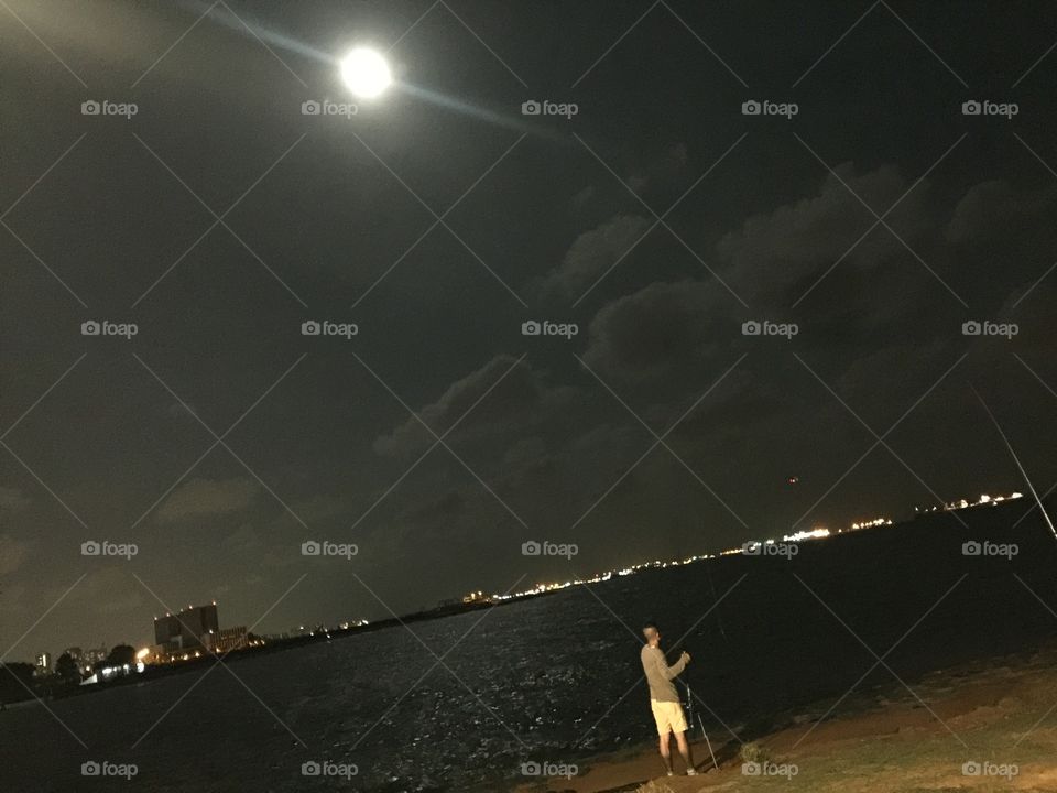 Night fishing by the moonlight