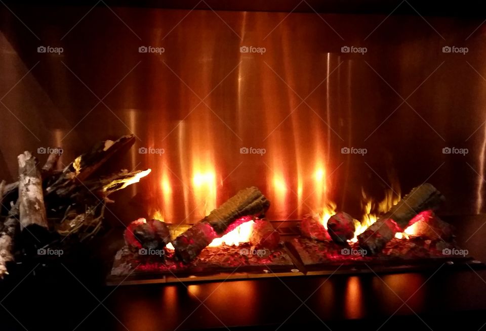 Artificial fireplace.