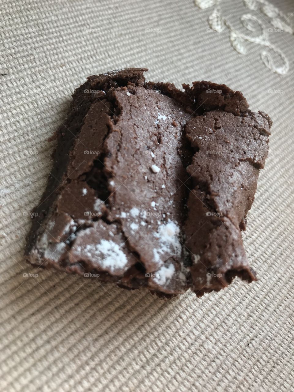 Good homemade brownie with ising sugar on top.                                   