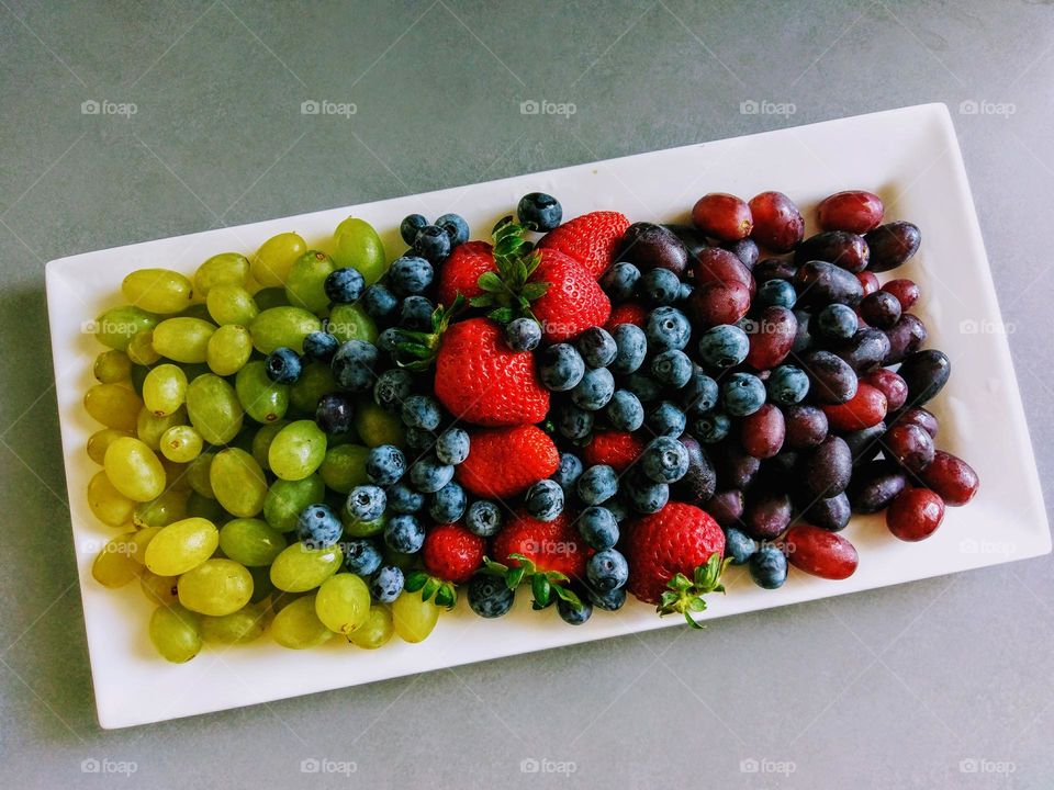Plate of fresh fruit on a summers day!