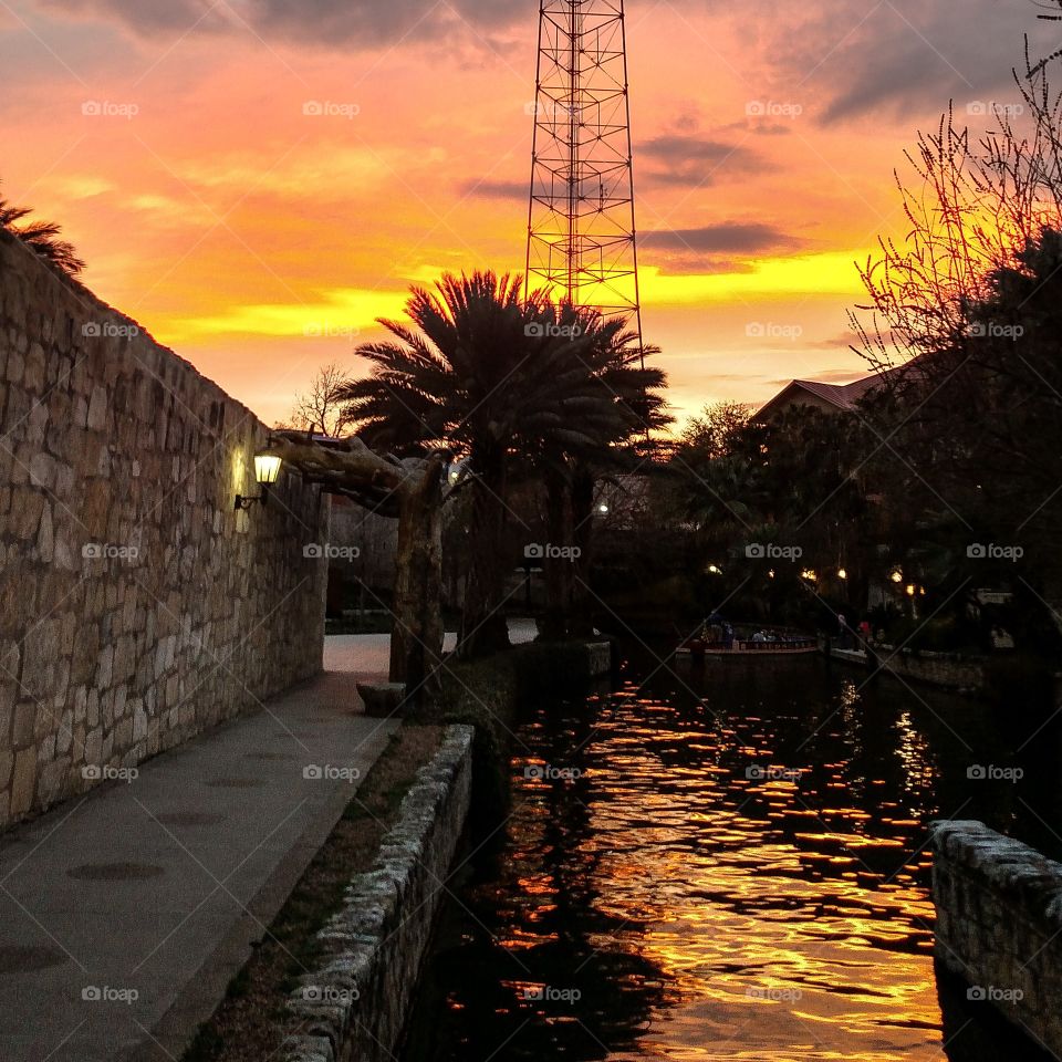 sunset on the river walk. walking the river walk.