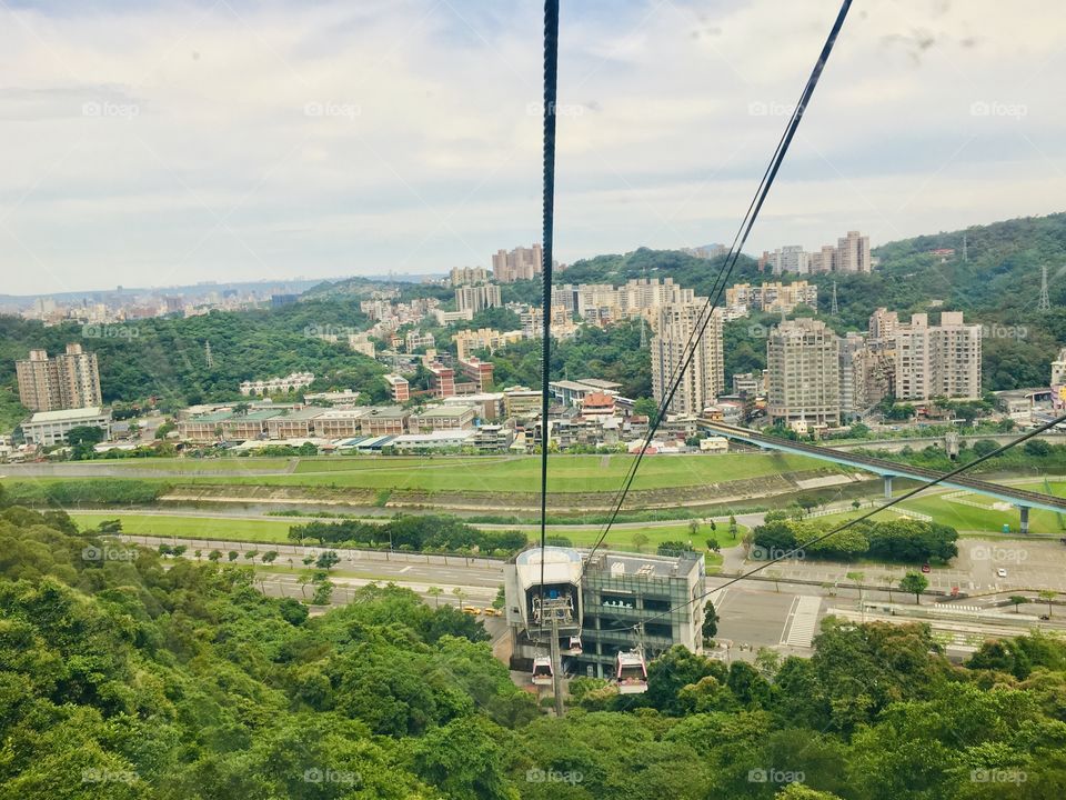 Riding the cable cars was fascinating i wonder how the cable cars worked, under the sky above the mountains and looking down there was the view of the whole country,hooray!