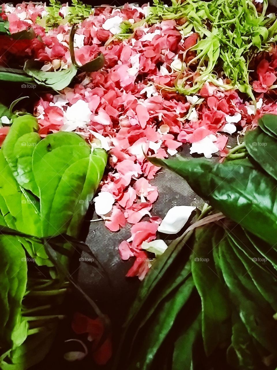Flowers and betel leaves