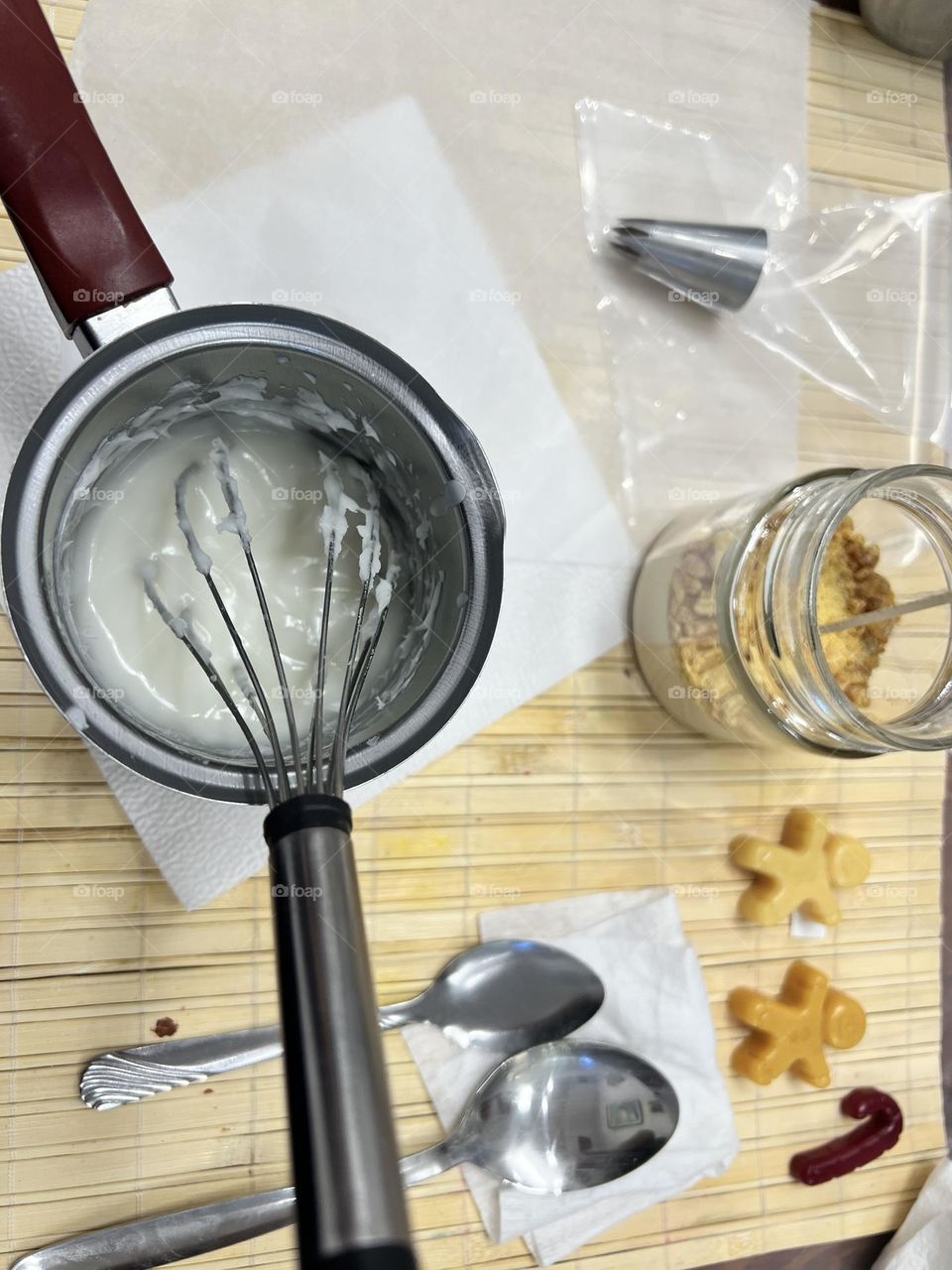 Working desk with wax and jar for making candles 