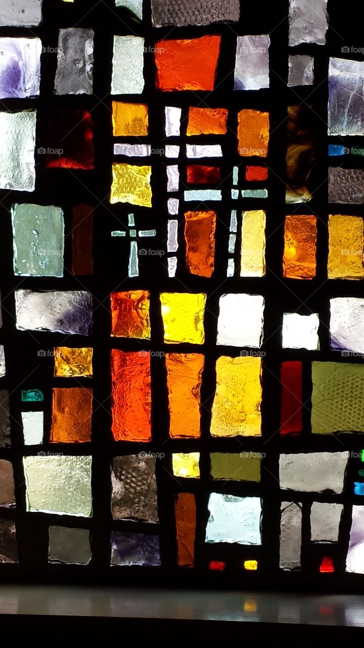 Stained Glass. I was at a church function and saw the patterns in the stained glass.  Just beautiful!