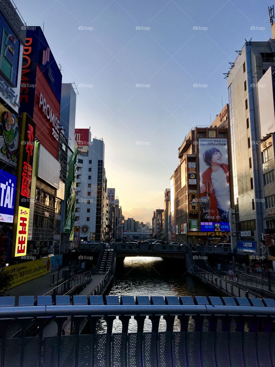 When i was walking down osaka, i took recognize of this bridge and its beautiful look out. The buildings and colors coordinated beautifully and ends with a nice view of dawn. I thought it looked like it came out straight out of an anime. 