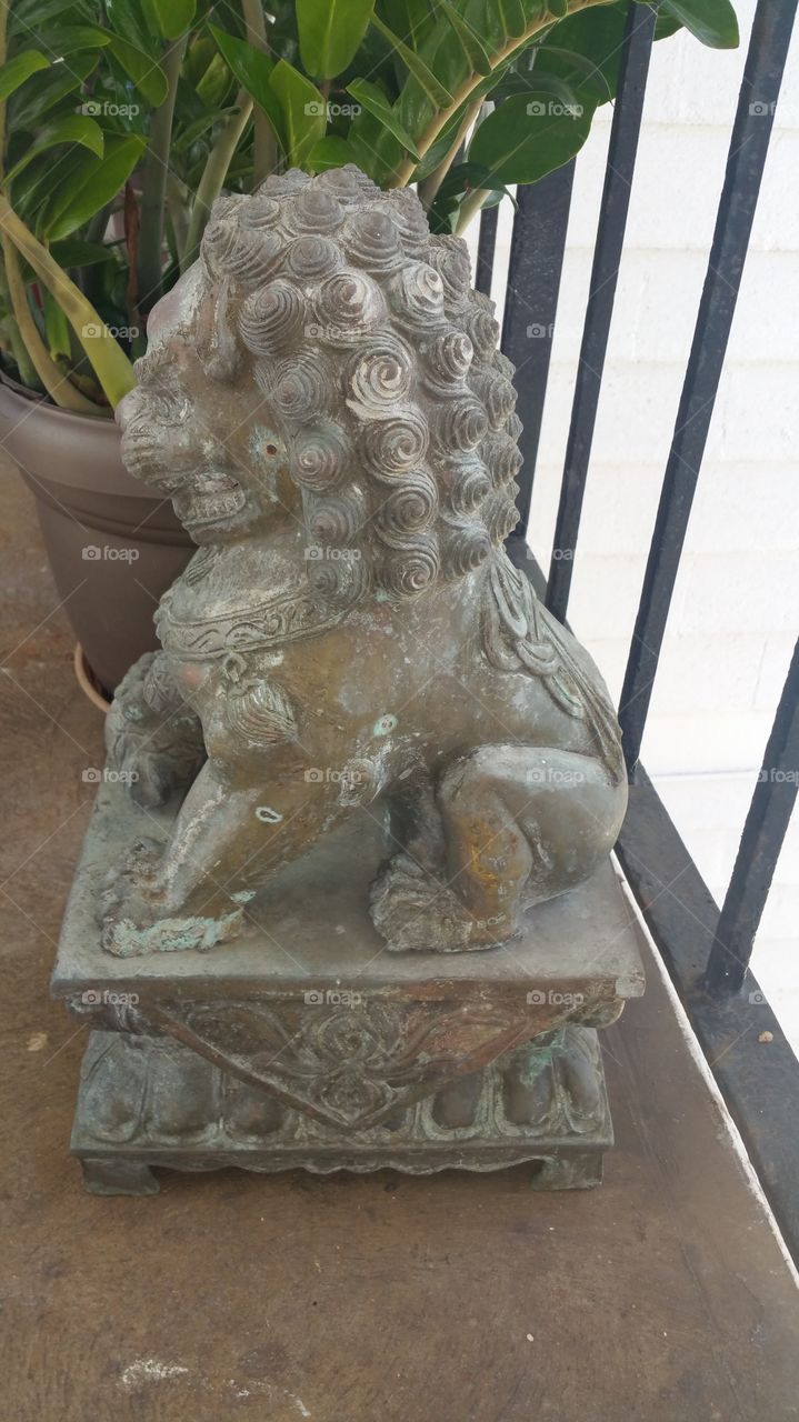 Small Chinese Statue . Small oriental garden ornament