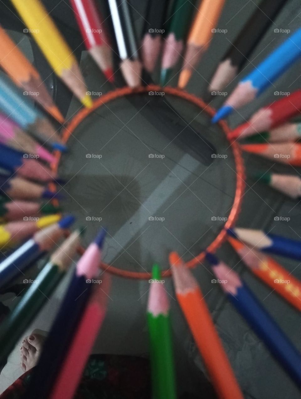coloured pencils in ring