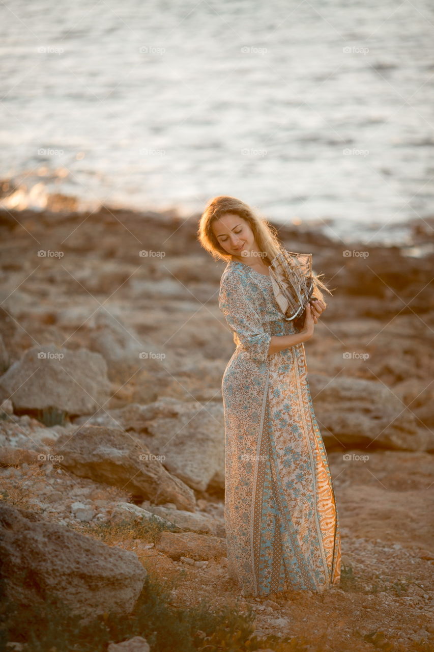 Portrait of beautiful young woman at outdoor