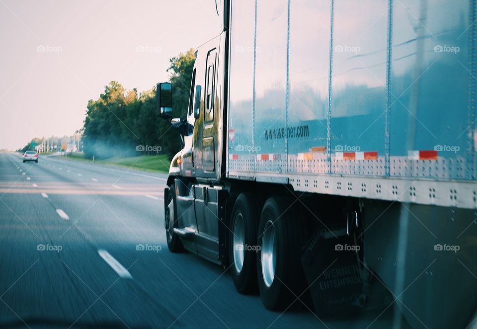 truck on highway speeding and heading destination 