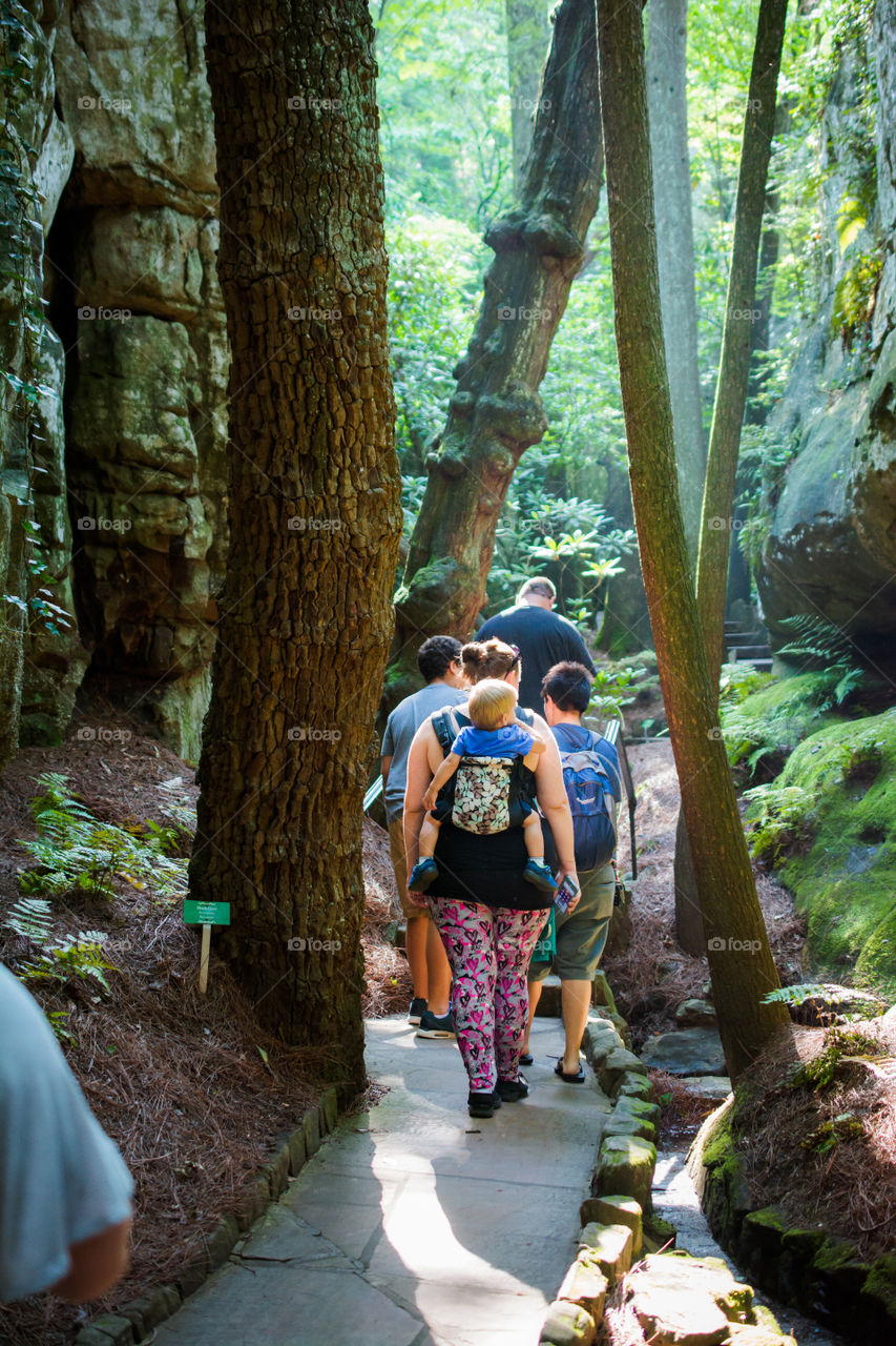 Group of People Walking on a Trail at See Rock City 