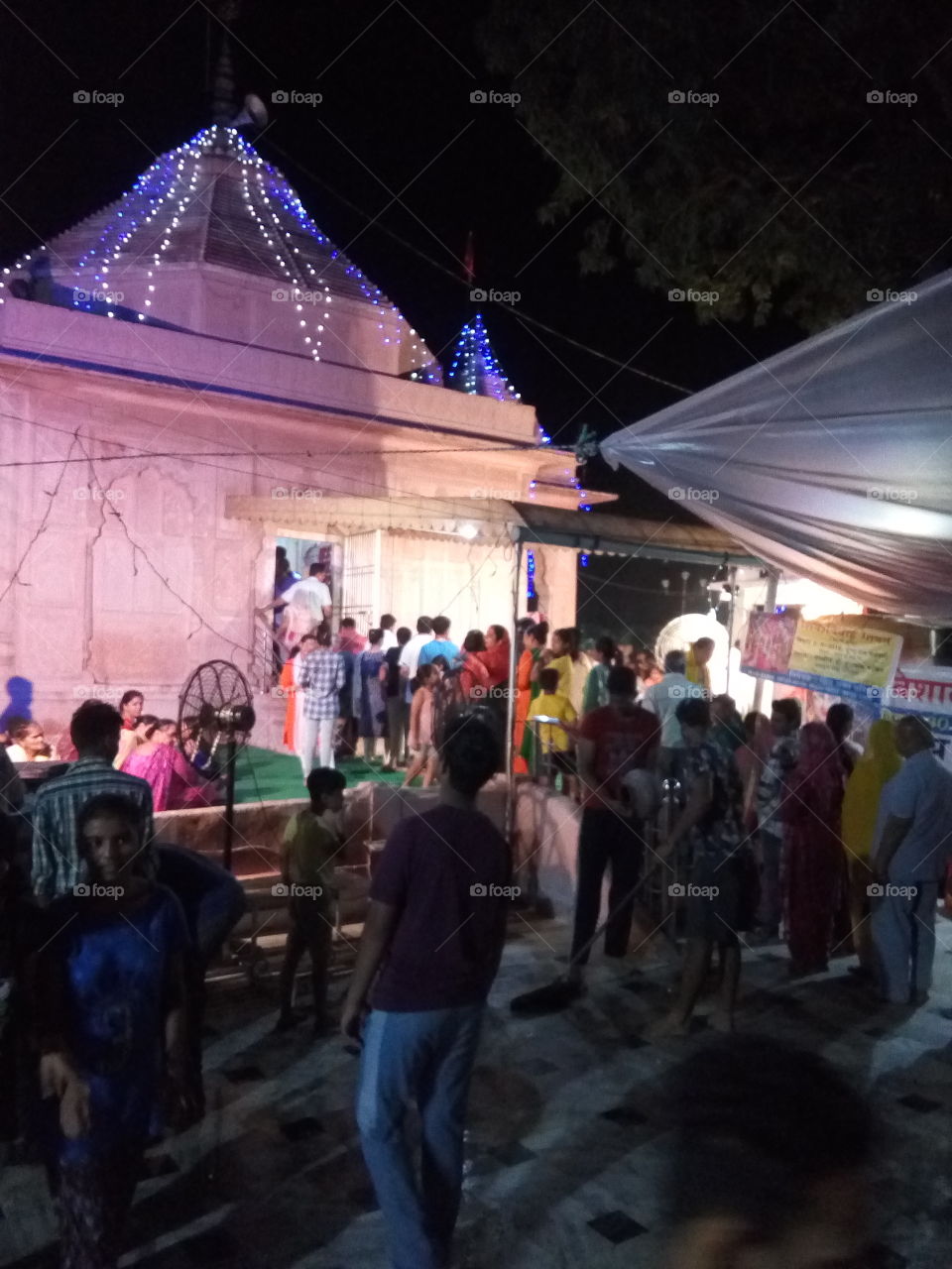 A queue of Lord Shiva's devotees in a temple at Patiala city. India.