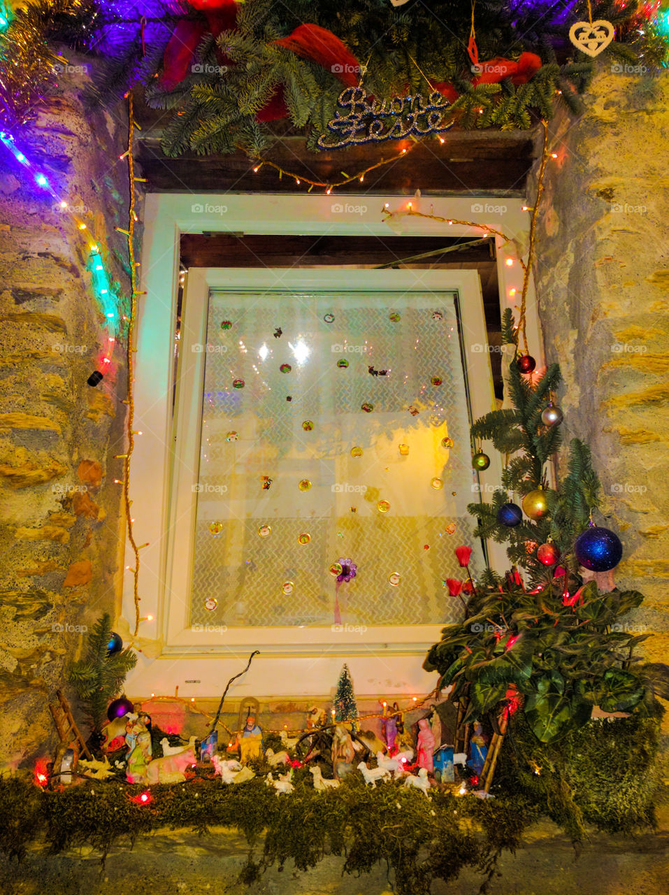 Presentation of a nativity scene on an outside window, a village of none Oariana, the Apuan Alps.