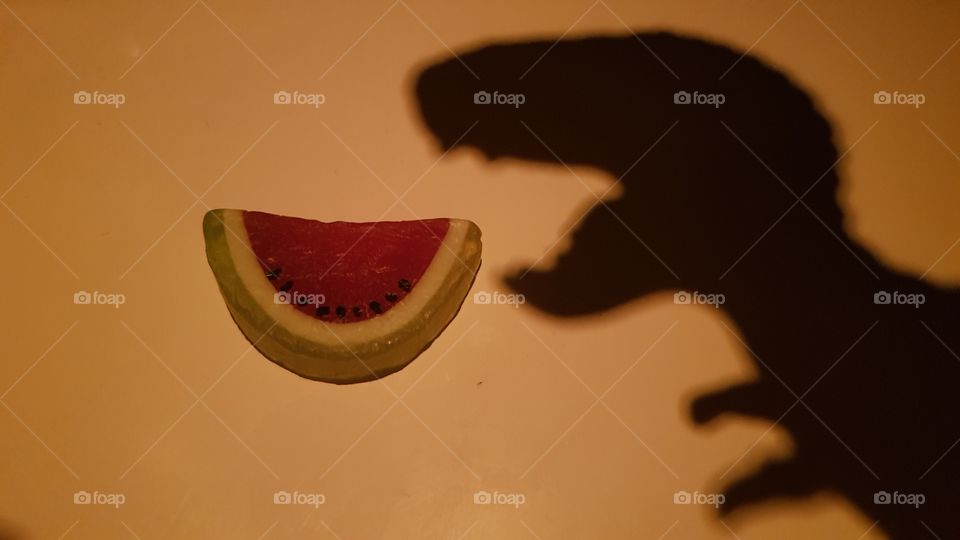 T-rex eating a watermelon